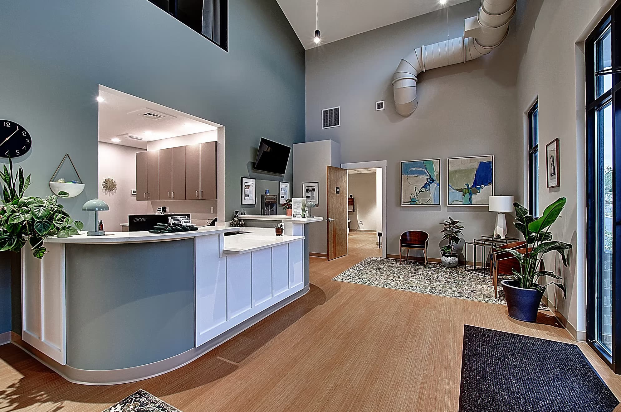 The calm, natural-light lobby at Collart Chiropractic & Healthcare